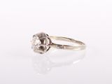 an old cut diamond ring with a single stone in the center