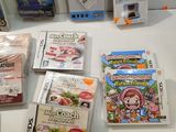 several nintendo wii games are sitting on a table next to each other