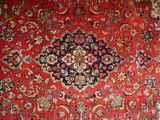 an image of a red carpet with a floral design