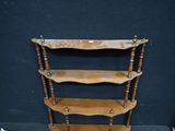 an image of a wooden shelf with three shelves on top of it