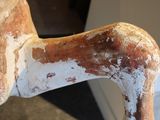 a close up view of a piece of wood with paint on it