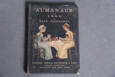 an old book with a picture of two women sitting at a table