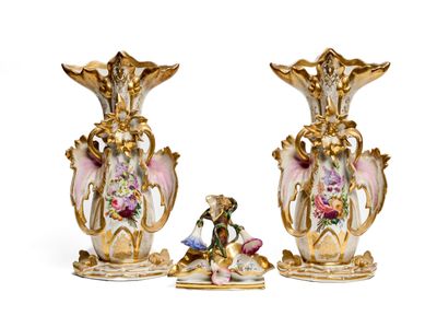 two vases that are decorated with flowers on them