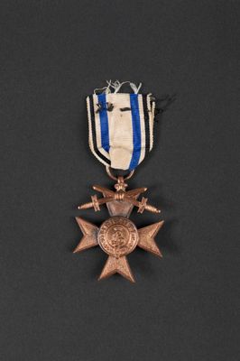 a close up of a medal on a black surface