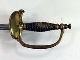 a sword that is sitting on a table