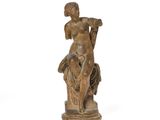 an image of a statue of a woman sitting on top of a horse