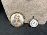 a necklace with a picture of a woman and a clock on it