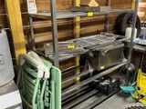 a metal shelf with a lot of items on it