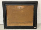 a close up of a black frame on a white wall