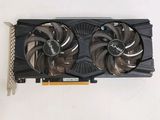 a close up of a video card with a fan on it