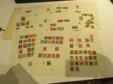 a table with a lot of stamps on it