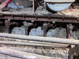a picture of a machine that is working on a piece of wood