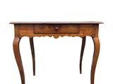 an image of a wooden table with a drawer underneath it