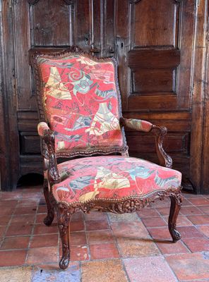 a chair that is sitting in front of a door