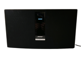 an image of a black speaker with a white background