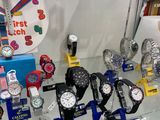 many different watches on display in a glass case