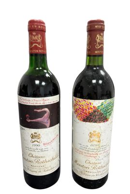 two bottles of wine sitting next to each other on a white surface