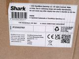 a box with a label on it that says shark