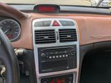 a dashboard of a car with a clock on it