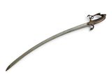 a close up of a sword on a white surface with a white background