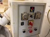 a machine that is sitting inside of a building