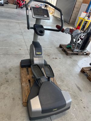 an image of a stationary exercise bike in a garage