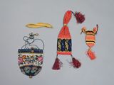 a small purse and a small purse with a hat on it