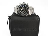 a close up of a watch in a case on a white background