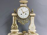 a clock that is sitting on top of a table