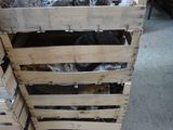 a pile of wood pallets stacked on top of each other