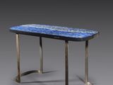 a close up of a table with a blue marble top