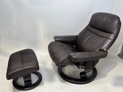 brown leather recliner chair and ottoman with matching foot stool