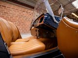 an old car with leather seats in a garage