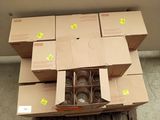 a pile of boxes sitting on a pallet on the floor