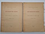 two pages of a book with red writing on them