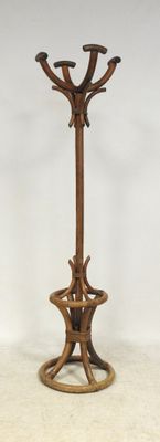an image of a wooden coat rack on a white background