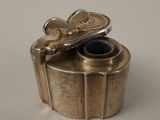 a small metal object that is sitting on a table