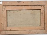 an old wooden picture frame with a picture of a dog in it