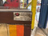 a close up of a metal box with a label on it