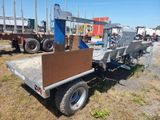 an image of a flatbed truck with a crane on the back
