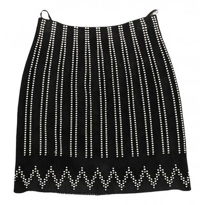 a black and white skirt with white dots on it