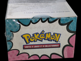 a box of pokemon trading cards sitting on a table