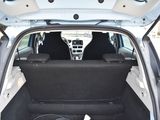a trunk of a car with the back seats folded down