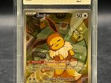 une image d'une carte Pokémon dans un étui en plastique
