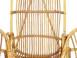 a wicker chair that is sitting on a white background