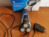 an image of a corded shaver and a box on a table