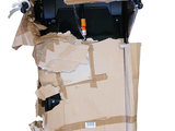 a cardboard box with a motorcycle inside of it