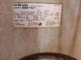 a label on the back of a machine that is not working