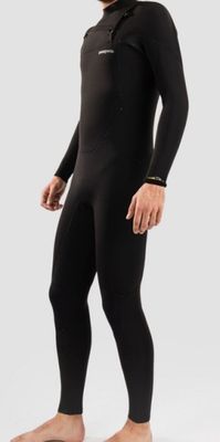 the man is wearing a black wetsuit and a hat