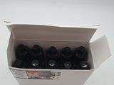six bottles of wine in a box on a white surface